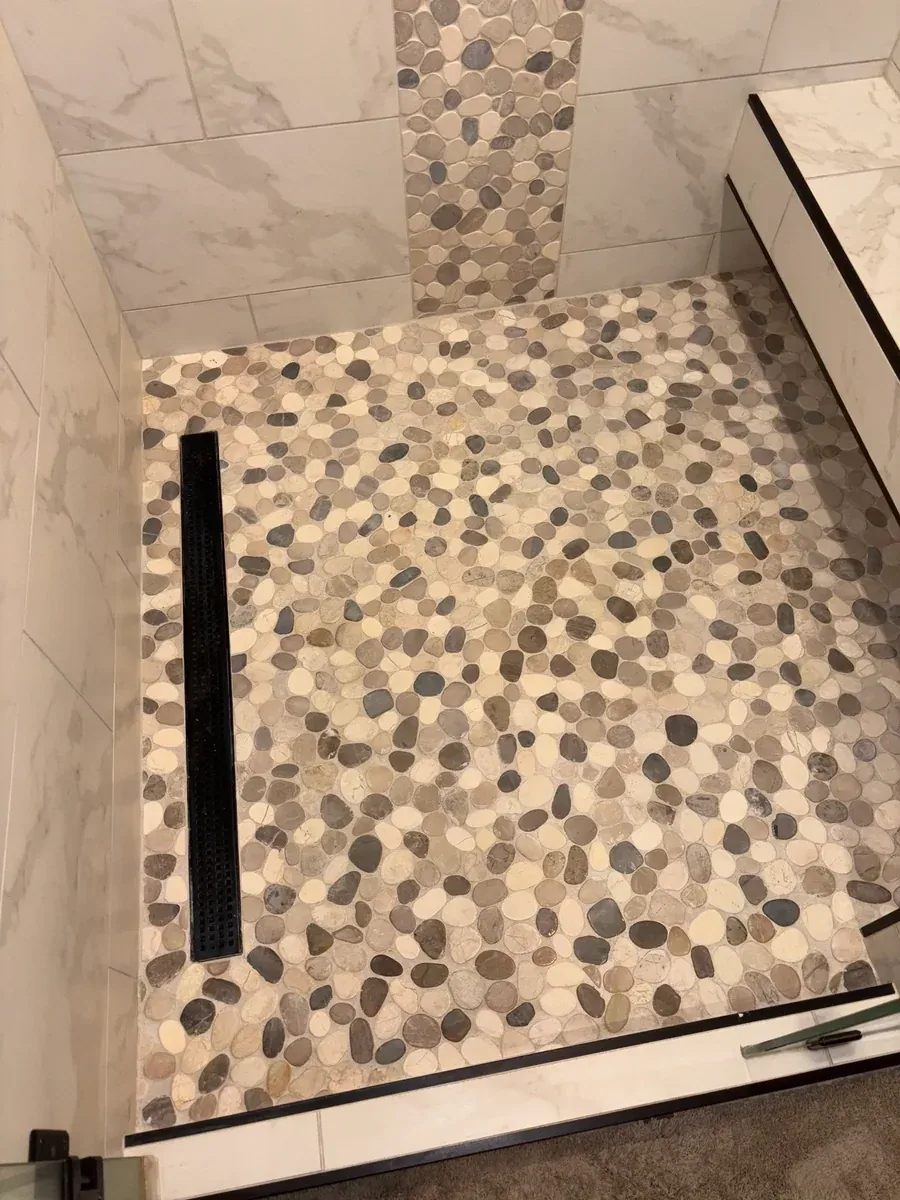 Pebble shower floor after cleaning